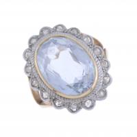 8-LARGE ROSETTE RING WITH BLUE TOPAZ .