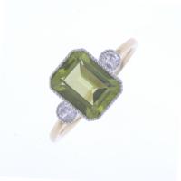 18-ART DECO STYLE RING WITH PERIDOT.