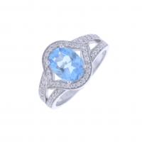 72-RING WITH TOPAZ AND DIAMONDS.