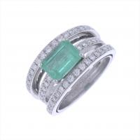 80-RING WITH CENTRAL EMERALD AND DIAMONDS.