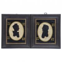 26008-PERRY HOFP (20TH-21ST CENTURY). PAIR OF DECORATIVE FRAMES, WITH SILHOUETTES OF A MAN AND A WOMAN.