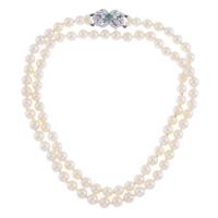 117-PEARLS LONG NECKLACE WITH DIAMONDS AND EMERALD CLASP.