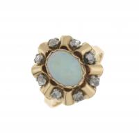 61-ART NOUVEAU STYLE RING WITH OPAL.