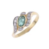 126-RING WITH EMERALD AND DIAMONDS.