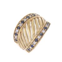 38-OPENWORK RING WITH DIAMONDS AND SAPPHIRES