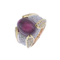 52-BICOLOUR PYRAMID-SHAPED RING WITH CABOCHON TOURMALINE.