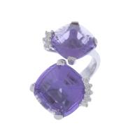 72-RING WITH TWO AMETHYSTS AND DIAMONDS.