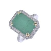 112-RING WITH LARGE EMERALD AND DIAMONDS