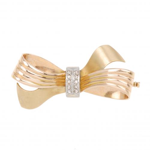 BROCHE LAZO EN ORO.