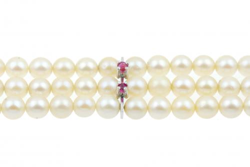 PULSERA DE PERLAS CON RUBÍES Y DIAMANTES.