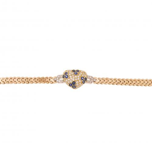 GOLD HEART BRACELET WITH DIAMONDS AND SAPPHIRES. 