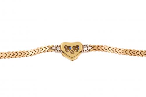 GOLD HEART BRACELET WITH DIAMONDS AND SAPPHIRES. 