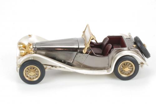 SILVER SCALE MODEL OF JAGUAR SS 100