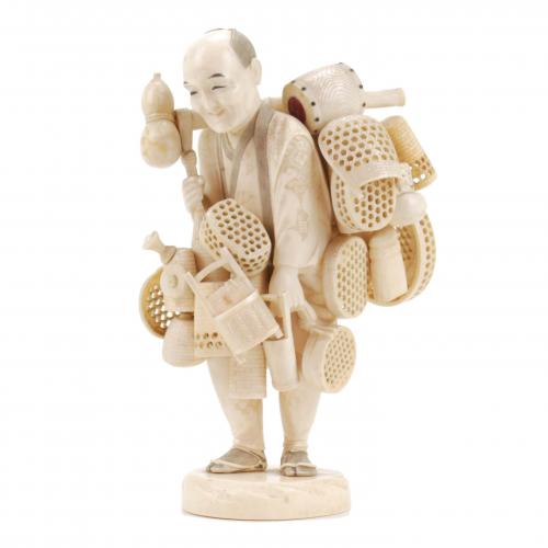 JAPANESE SCHOOL, MEIJI PERIOD, LATE C 19th OKIMONO, "SCRAP DEALER"