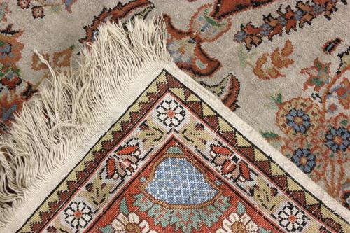 TWO SMALL PERSIAN CARPETS, MID C20th.