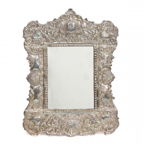 TABLE TOP MIRROR WITH SILVER FRAME, PROBABLY END C16th.
