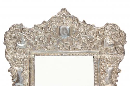 TABLE TOP MIRROR WITH SILVER FRAME, PROBABLY END C16th.