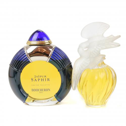 DOS GRANDES BOTELLAS DE PERFUME.