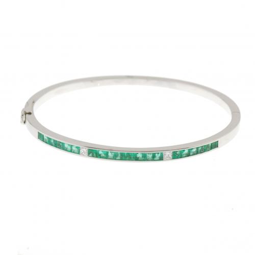 DIAMOND AND EMERALD SLAVE BRACELET.
