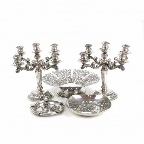 PAIR OF SPANISH SILVER CANDELABRA AND THREE CENTREPIECES, M