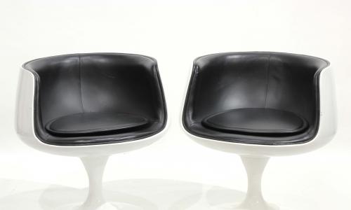 AFTER MODELS OF EERO AARNIO (1932). PAIR OF "COGNAC CHAIRS"