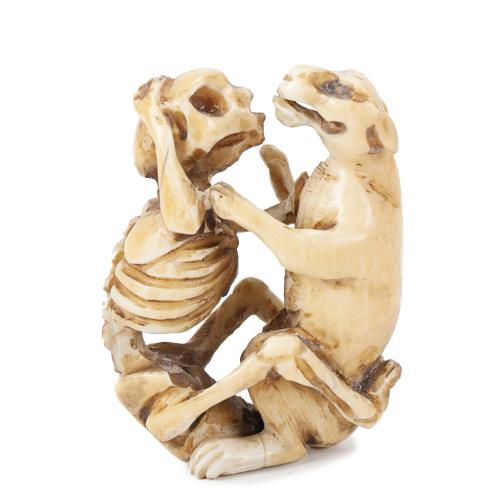 JAPANESE SCHOOL, MEIJI PERIOD, C19th.  NETSUKE "DOG WITH SKELETON".
