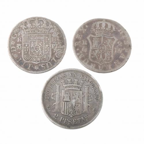 THREE SILVER COINS.