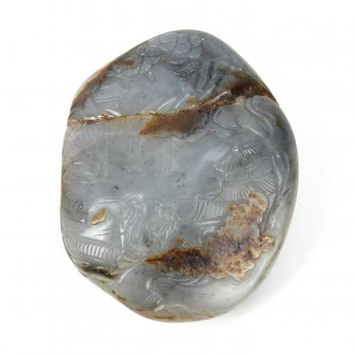 SMALL CHINESE ORNAMENTAL STONE IN RIVER JADE, 20TH CENTURY.