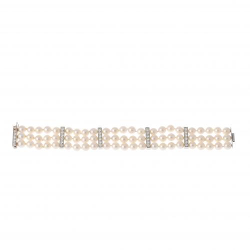 PULSERA DE PERLAS Y DIAMANTES.