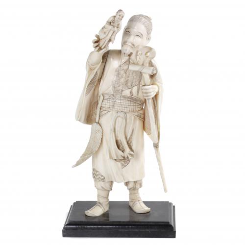 JAPANESE SCHOOL. MEIJI PERIOD, LATE 19TH CENTURY. OKIMONO DEPICTING A COSTUME CHARACTER OF THE TIME.
