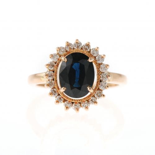 ROSETTE RING WITH SAPPHIRE AND DIAMONDS.