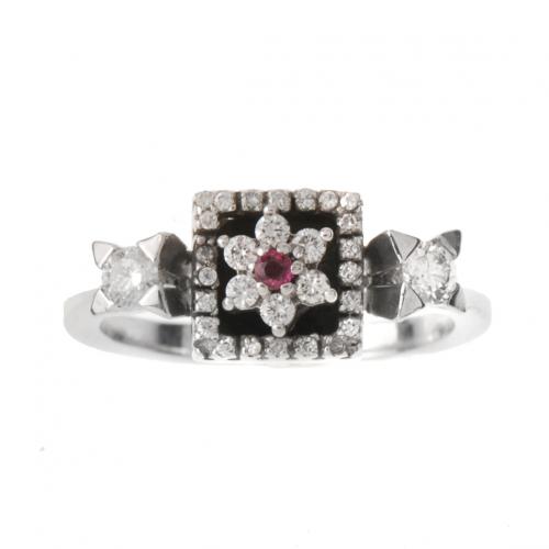 ORIGINAL SORTIJA DE DIAMANTES CON PEQUEÑO RUBÍ CENTRAL.
