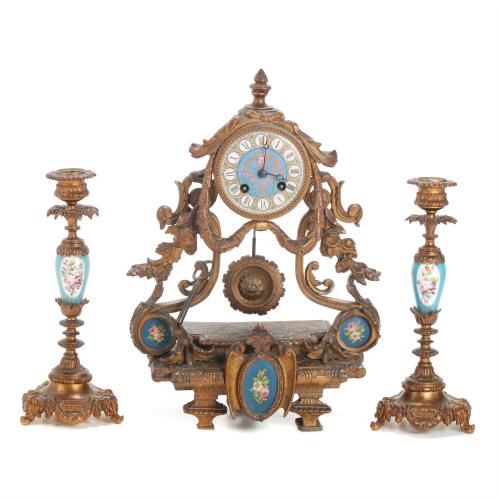 NAPOLEON III STYLE CLOCK WITH TWO CANDLESTICKS, FIRST HALF 20TH CENTURY.