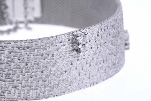 WHITE GOLD AND DIAMONDS SEMI-RIGID BRACELET.