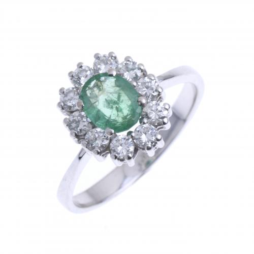 RING WITH DIAMONDS AND CENTRAL EMERALD.