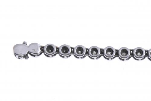 WHITE GOLD AND DIAMONDS RIVIÈRE BRACELET.