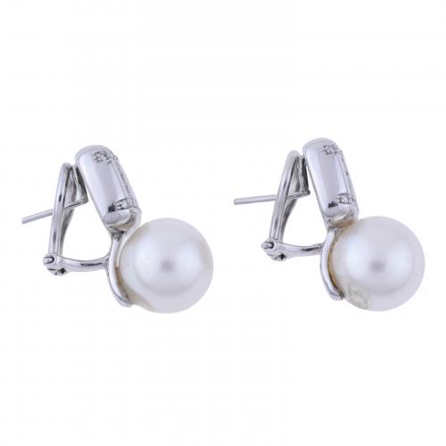 DIAMONDS AND PEARL EARRINGS.