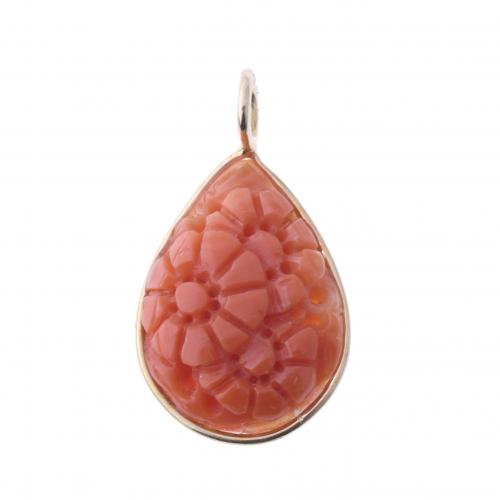 CARVED CORAL PENDANT.