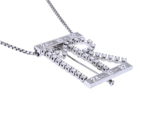 NECKLACE AND PENDANT WITH THE LETTERS MR IN DIAMONDS.