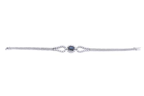 PLATINUM BRACELET WITH SAPPHIRE AND DIAMONDS.