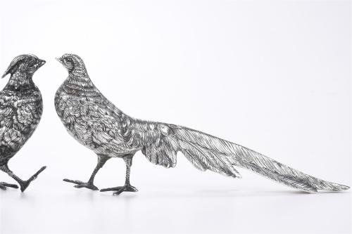 SPANISH DOVE AND PHEASANT IN SILVER, MID 20TH CENTURY.