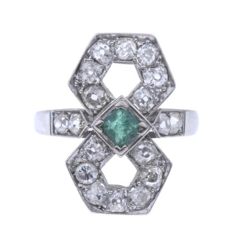 DIAMOND AND EMERALD INFINITY RING.