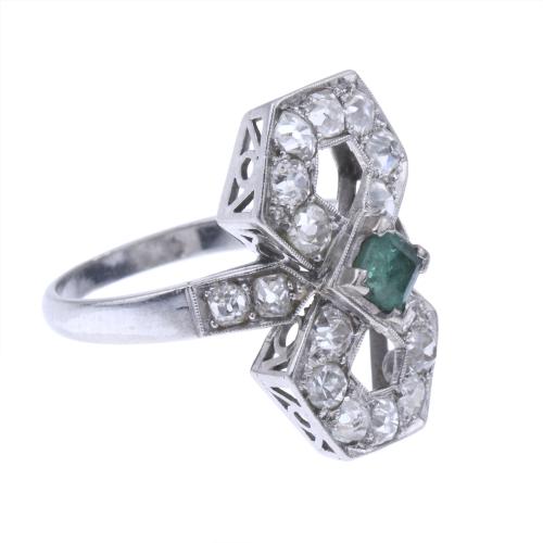 DIAMOND AND EMERALD INFINITY RING.