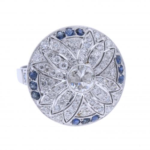 FLOWER RING WITH SAPPHIRES AND DIAMONDS.