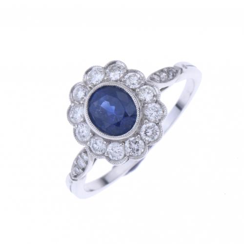 ROSETTE RING WITH SAPPHIRE AND DIAMONDS.