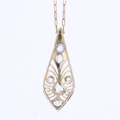 MODERNIST PENDANT IN YELLOW GOLD, PLATINUM AND DIAMONDS.