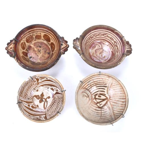 FOUR BOWLS FROM MANISES, LATE 15TH CENTURY AND LATE 17TH-EARLY 18TH CENTURY.