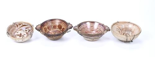 FOUR BOWLS FROM MANISES, LATE 15TH CENTURY AND LATE 17TH-EA