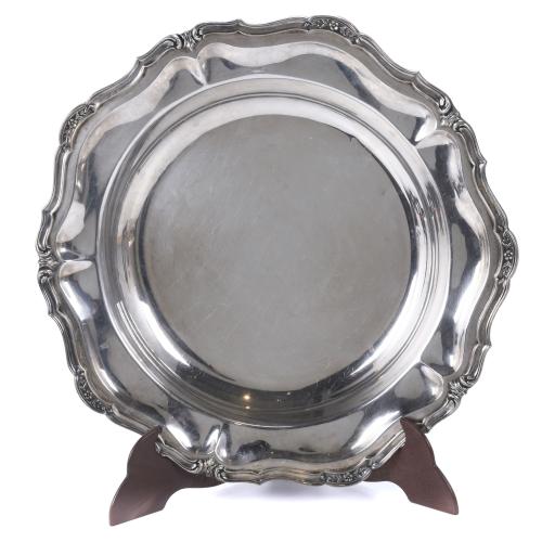 PERUVIAN PLATTER AND FOUR ROUND TRAYS IN SILVER, SECOND HAL