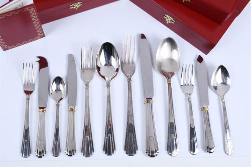 CARTIER. TWELVE-SERVICE CUTLERY SET, "LA MAISON DE LOUIS CA